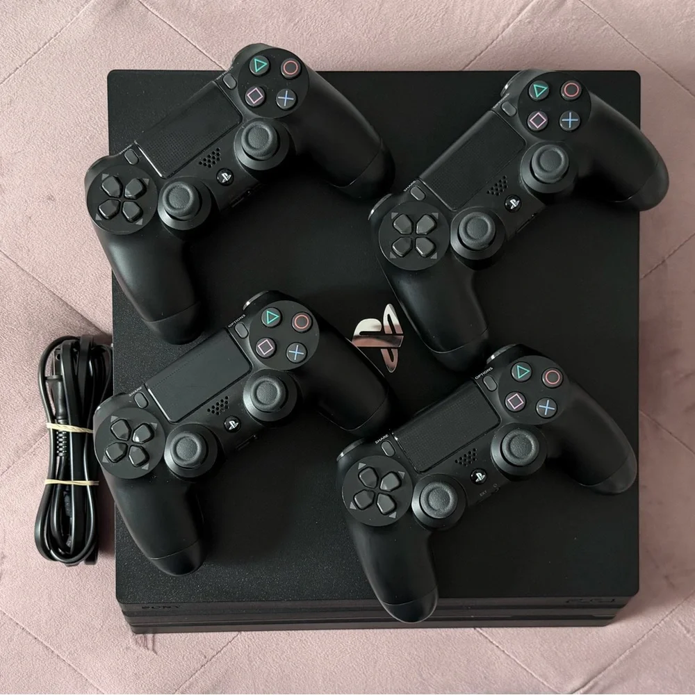 Sony PlayStation 4 Pro 1TB Bundle - 1 Console + 4 Controllers